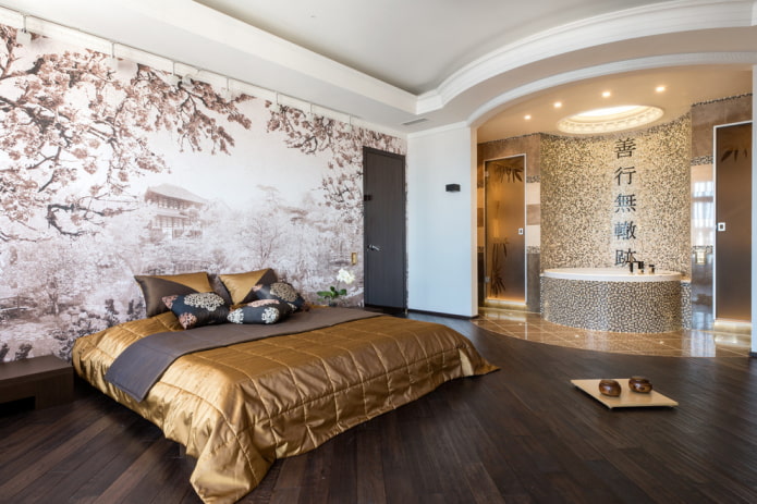 cama con una colcha dorada en el dormitorio