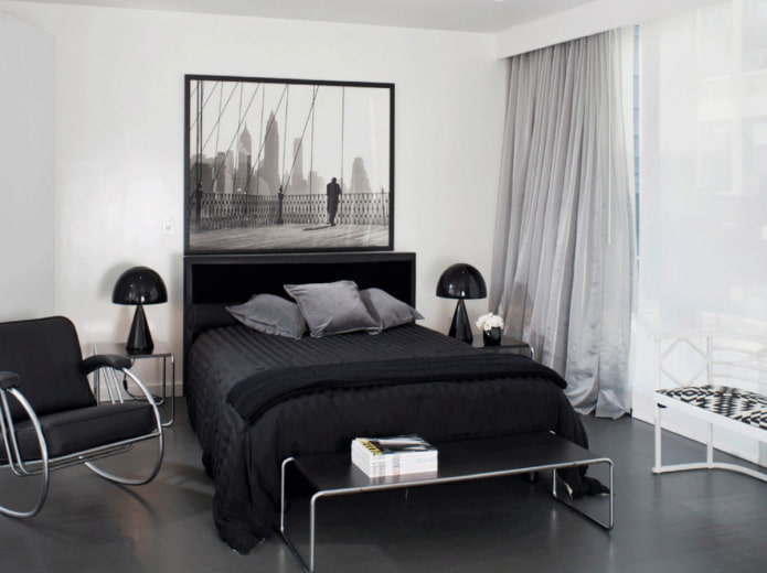 dormitorio monocromático con suelo oscuro