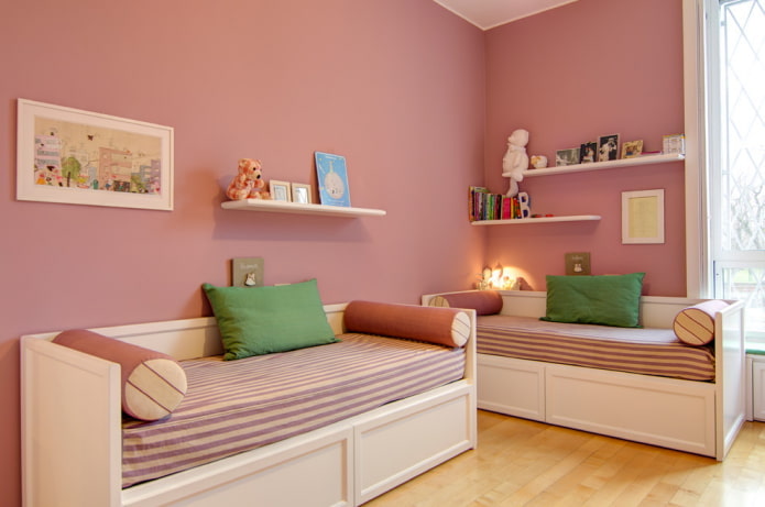 Interior de dormitorio rosa para dos niñas