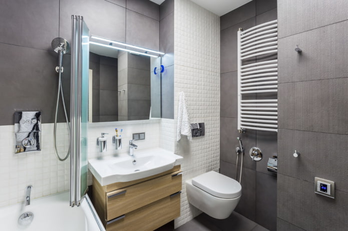 Interior de baño en tonos blancos y grises