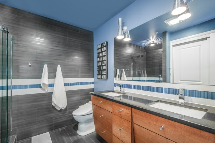 interior de baño en tonos grises y azules