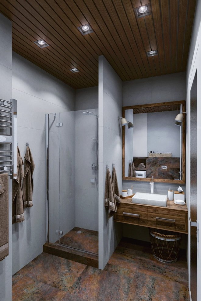 Interior de baño en tonos gris-marrón