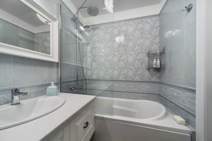 diseño de baño pequeño en tonos grises