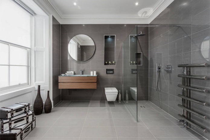 interior de baño moderno con azulejos grises rectangulares