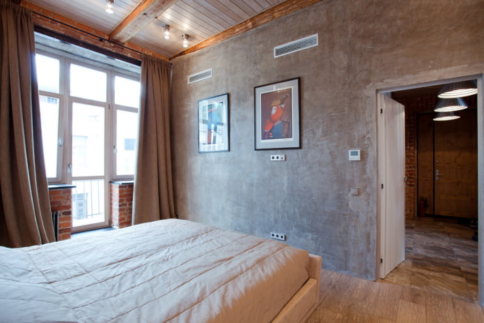 cortinas de tapete en un dormitorio tipo loft