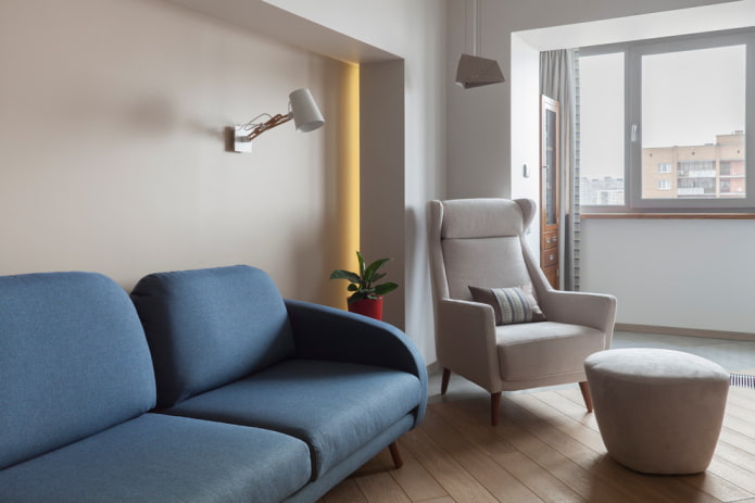 sofás azules en combinación con un sillón