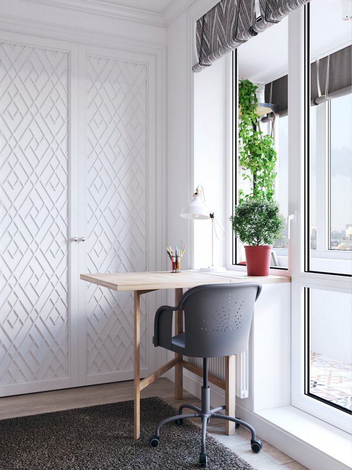 Interior del área de trabajo en un estudio de 26 m²