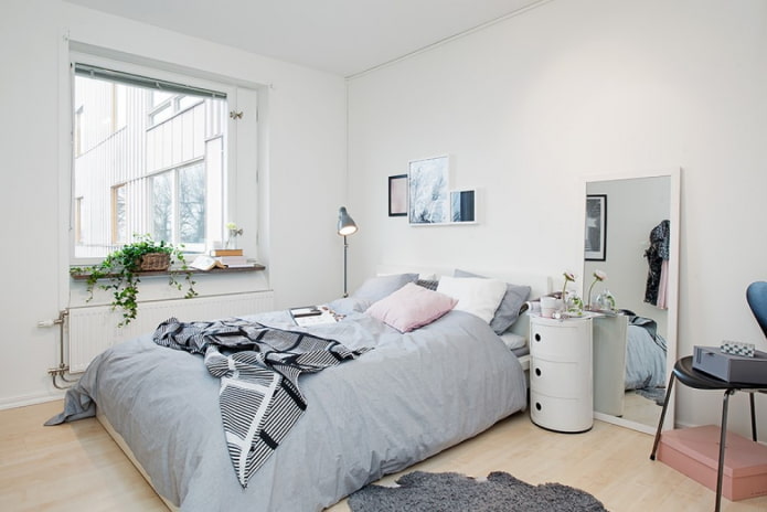 suelos claros en un interior de dormitorio de estilo escandinavo
