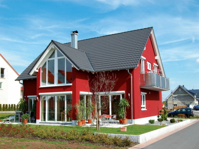 casa roja con techo negro