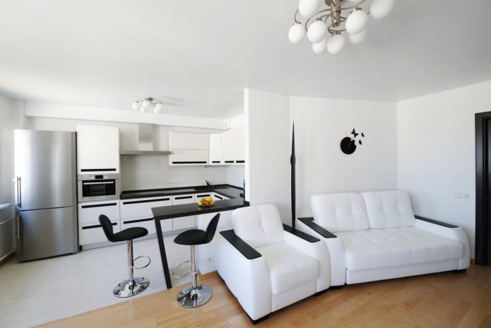Barra de bar con diseño de cocina-salón en blanco y negro