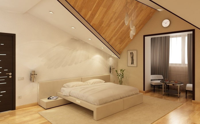 diseño de un dormitorio abuhardillado con balcón