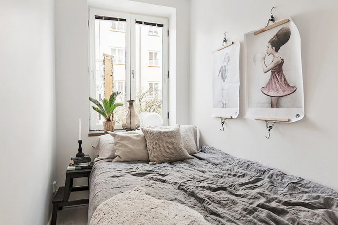 Pósteres en un dormitorio pequeño