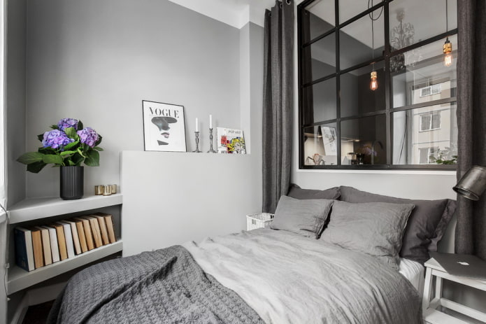 pared gris en el dormitorio de estilo escandinavo