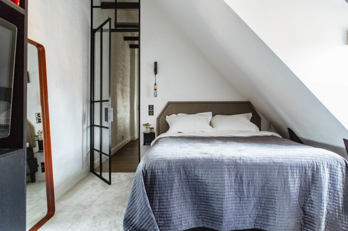 dormitorio abuhardillado de estilo escandinavo