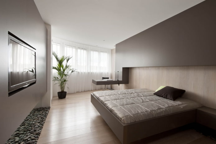 Dormitorio con zona de trabajo