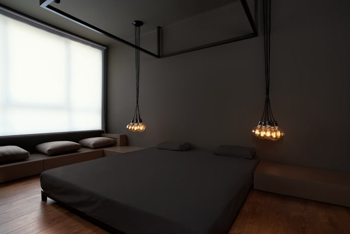 Iluminación en el interior del dormitorio en un estilo minimalista
