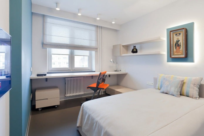 Alféizar de ventana que se convierte en mesa en el dormitorio