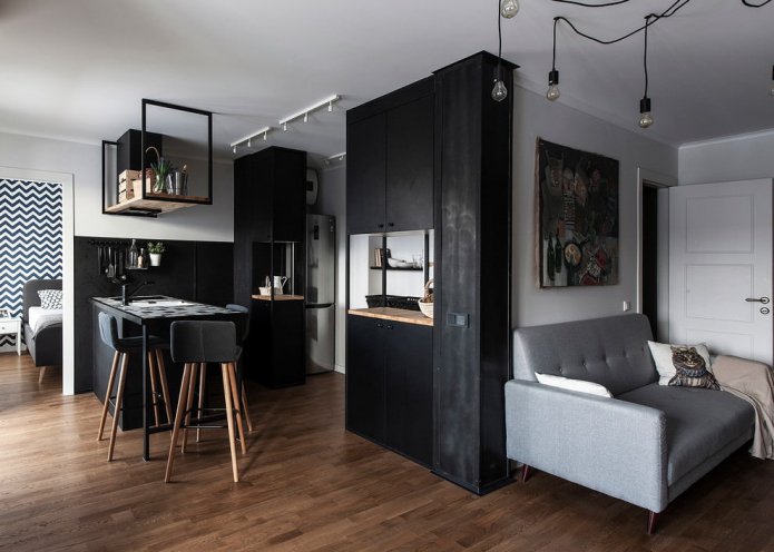 conjunto de muebles negros y sofá gris