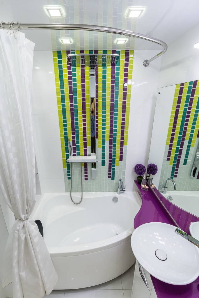 Bañera esquinera con ducha