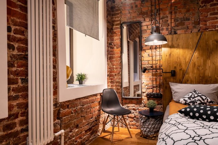 Lámpara de techo en un dormitorio tipo loft