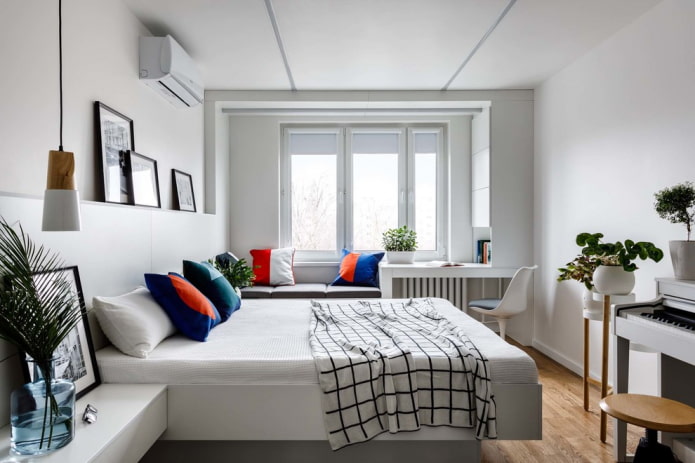 Dormitorio con molduras de luz