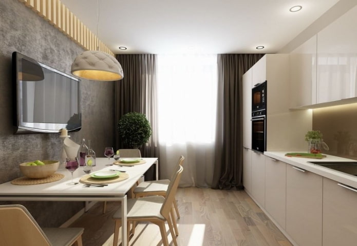Televisor sobre la mesa en la cocina
