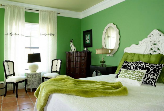 Dormitorio verde a juego con textiles