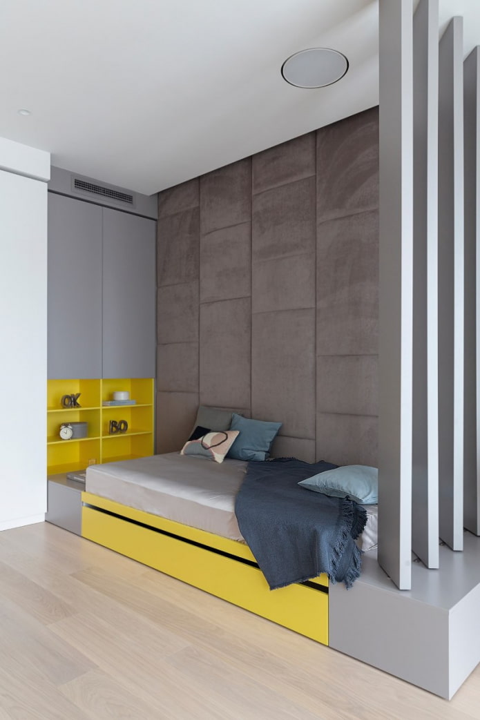 Dormitorio minimalista con detalles amarillos