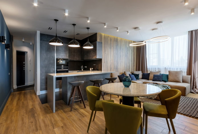 Zonificación con iluminación en el interior de la cocina-salón