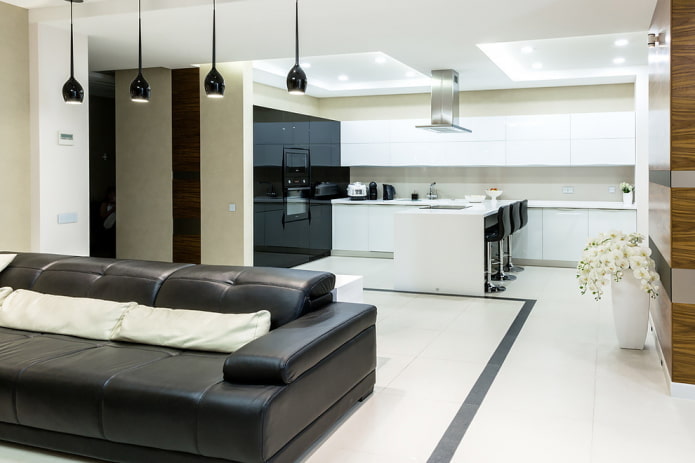 Zonificación con iluminación en el interior de la cocina-salón